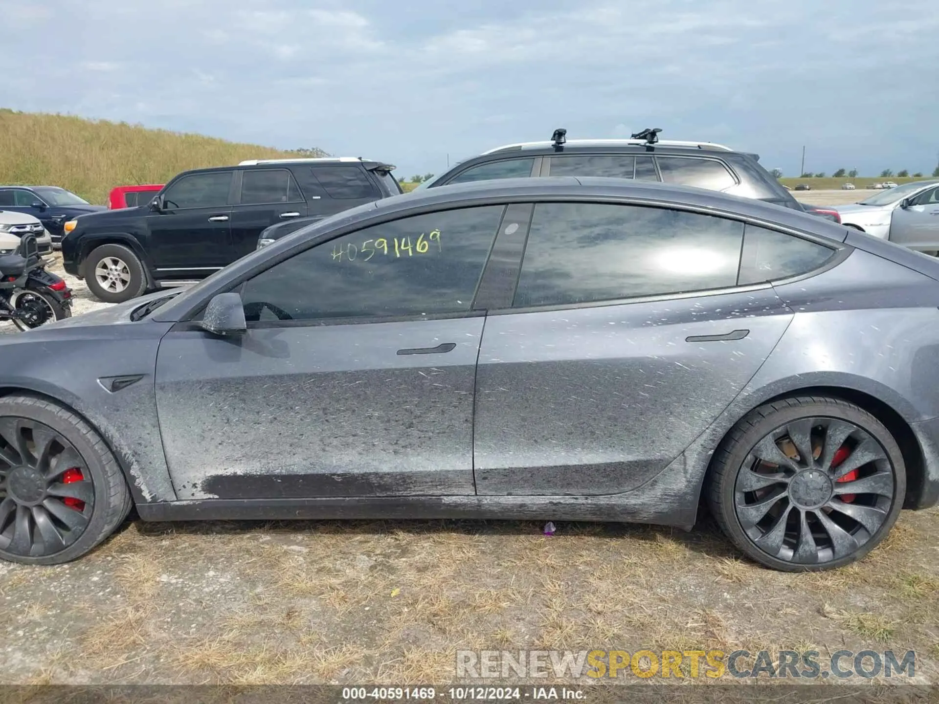 13 Photograph of a damaged car 5YJ3E1ECXPF668892 TESLA MODEL 3 2023