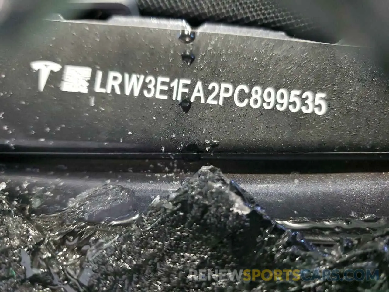12 Photograph of a damaged car LRW3E1FA2PC899535 TESLA MODEL 3 2023