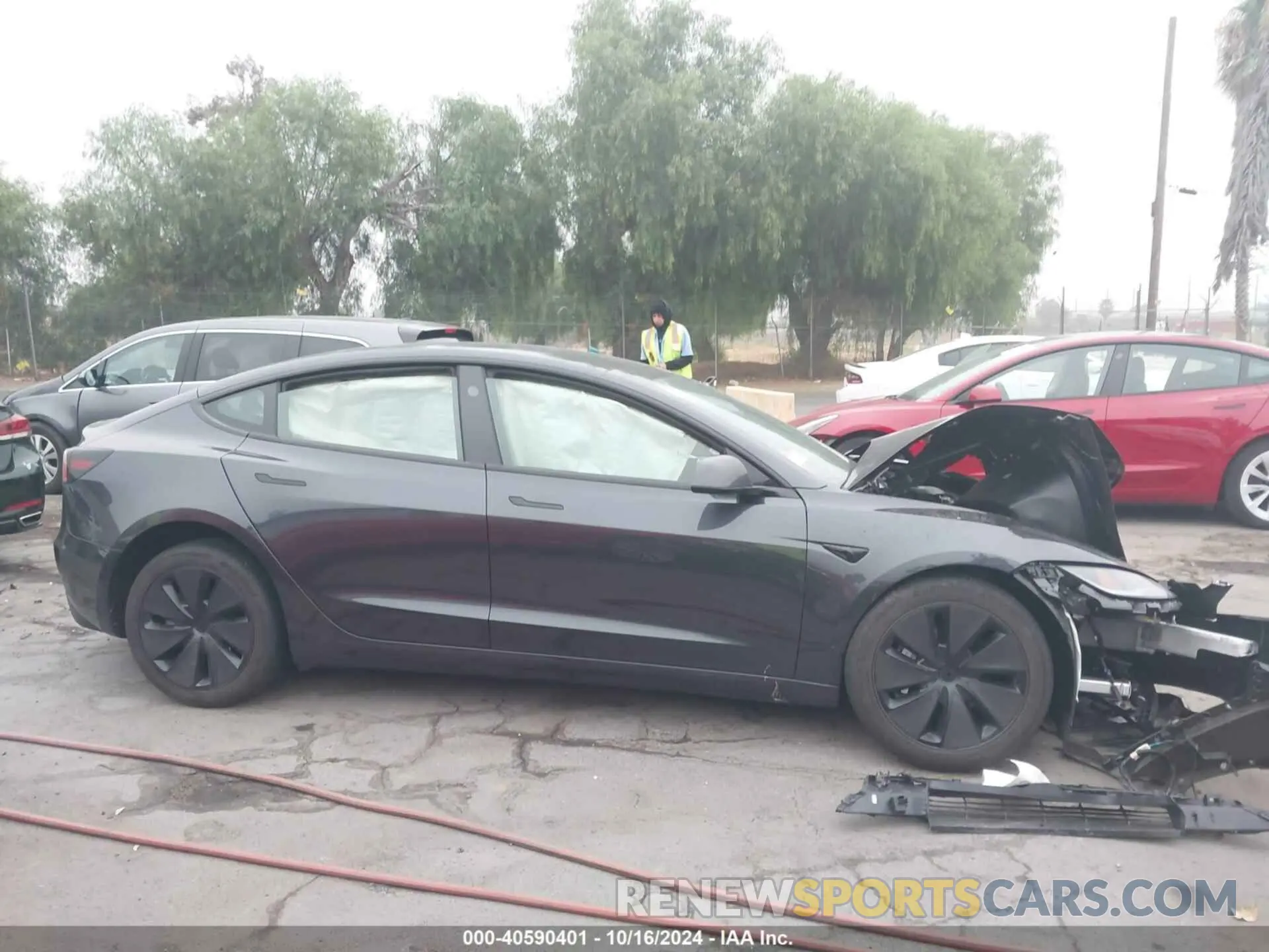 13 Photograph of a damaged car 5YJ3E1EA0RF744072 TESLA MODEL 3 2024