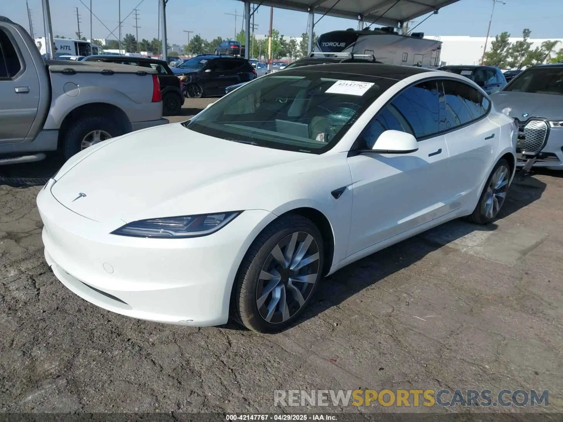 2 Photograph of a damaged car 5YJ3E1EA0RF752172 TESLA MODEL 3 2024