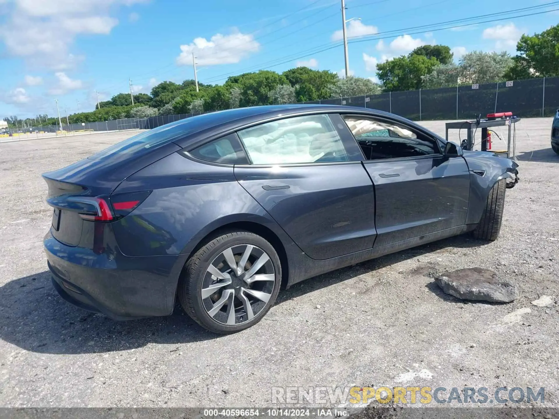 4 Photograph of a damaged car 5YJ3E1EA2RF751069 TESLA MODEL 3 2024