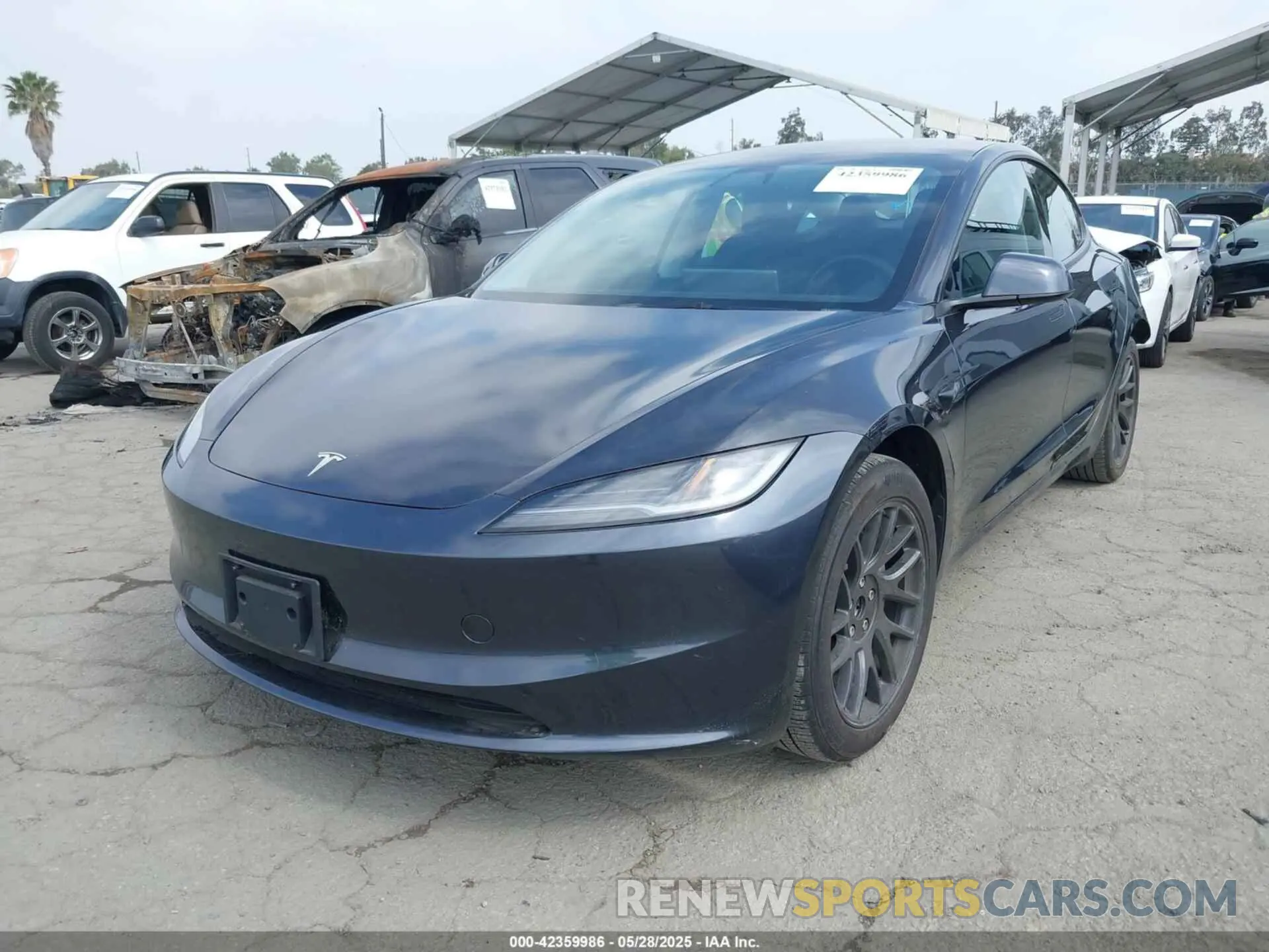 2 Photograph of a damaged car 5YJ3E1EA3RF729713 TESLA MODEL 3 2024