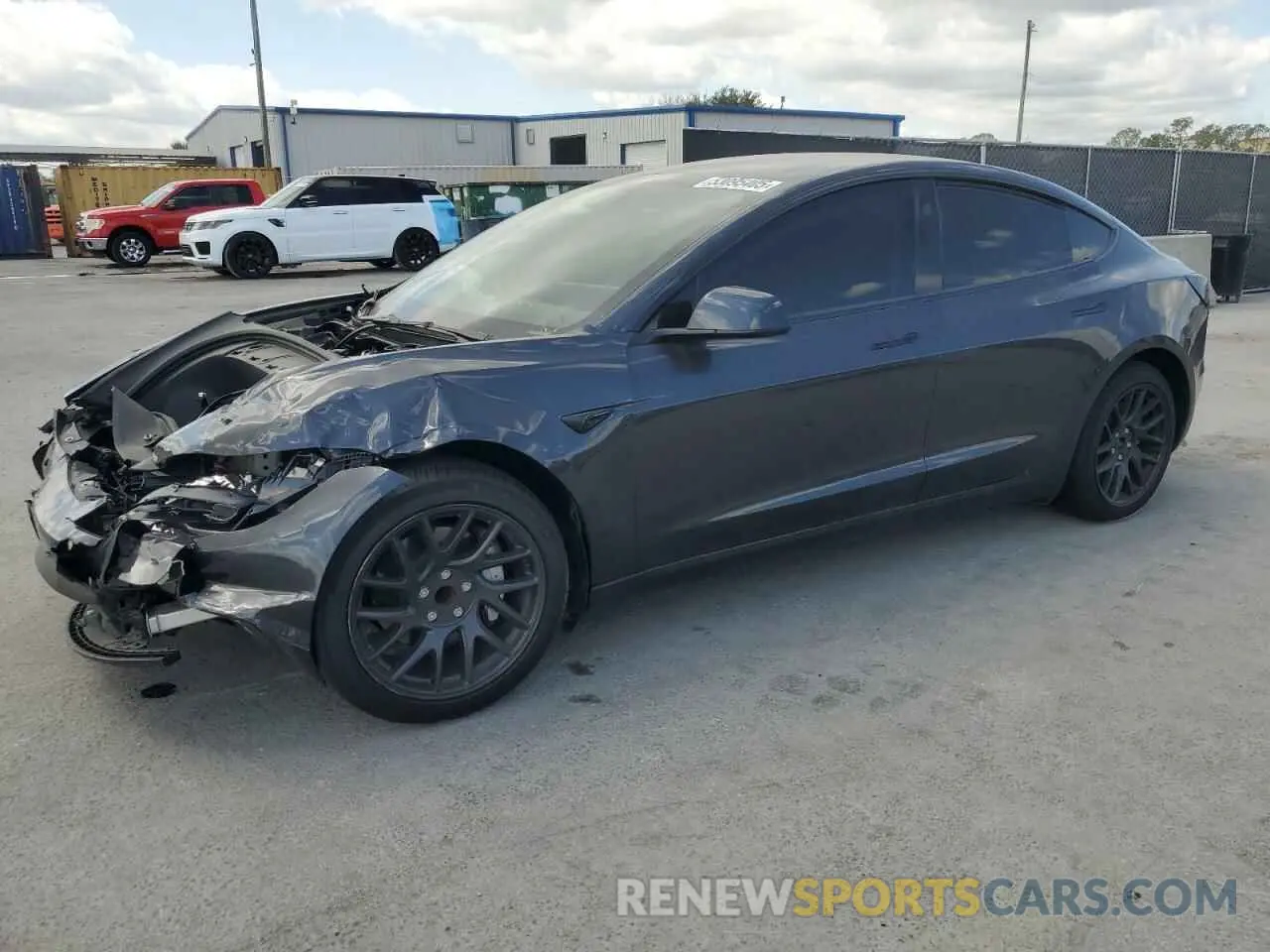 1 Photograph of a damaged car 5YJ3E1EA3RF752232 TESLA MODEL 3 2024