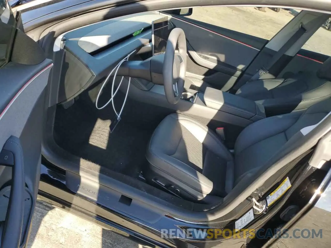 7 Photograph of a damaged car 5YJ3E1EA3RF752716 TESLA MODEL 3 2024