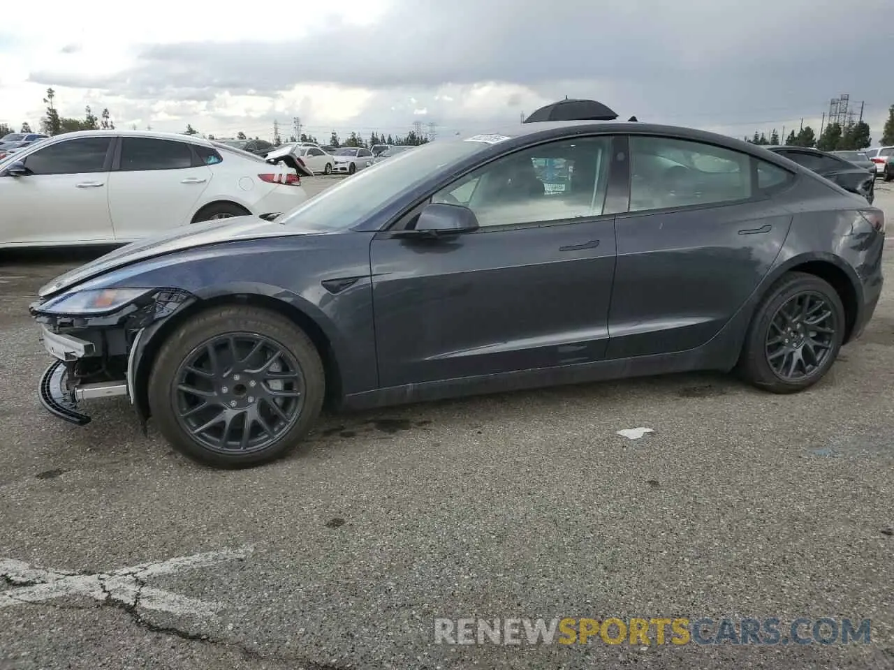 1 Photograph of a damaged car 5YJ3E1EA3RF864786 TESLA MODEL 3 2024
