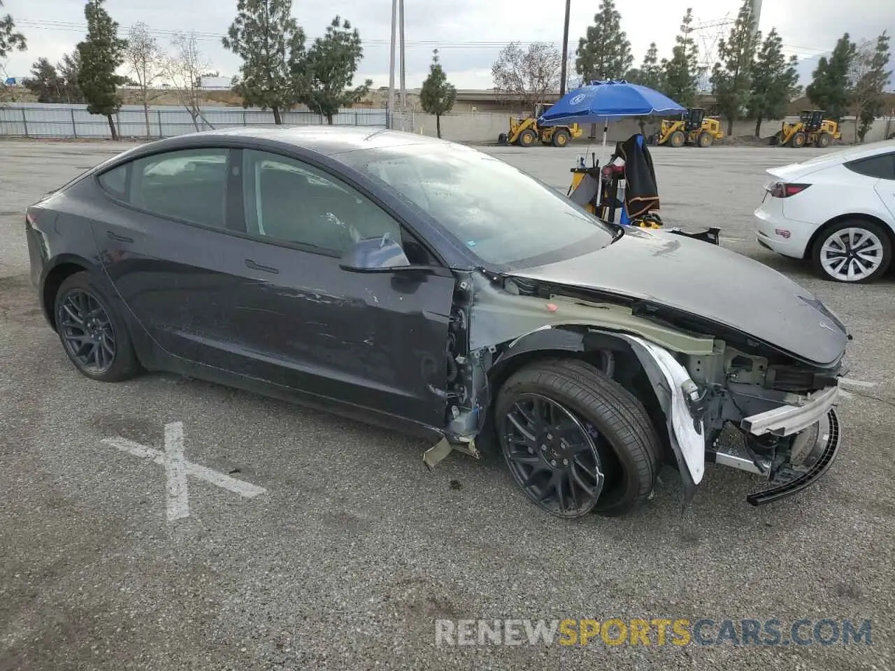 4 Photograph of a damaged car 5YJ3E1EA3RF864786 TESLA MODEL 3 2024