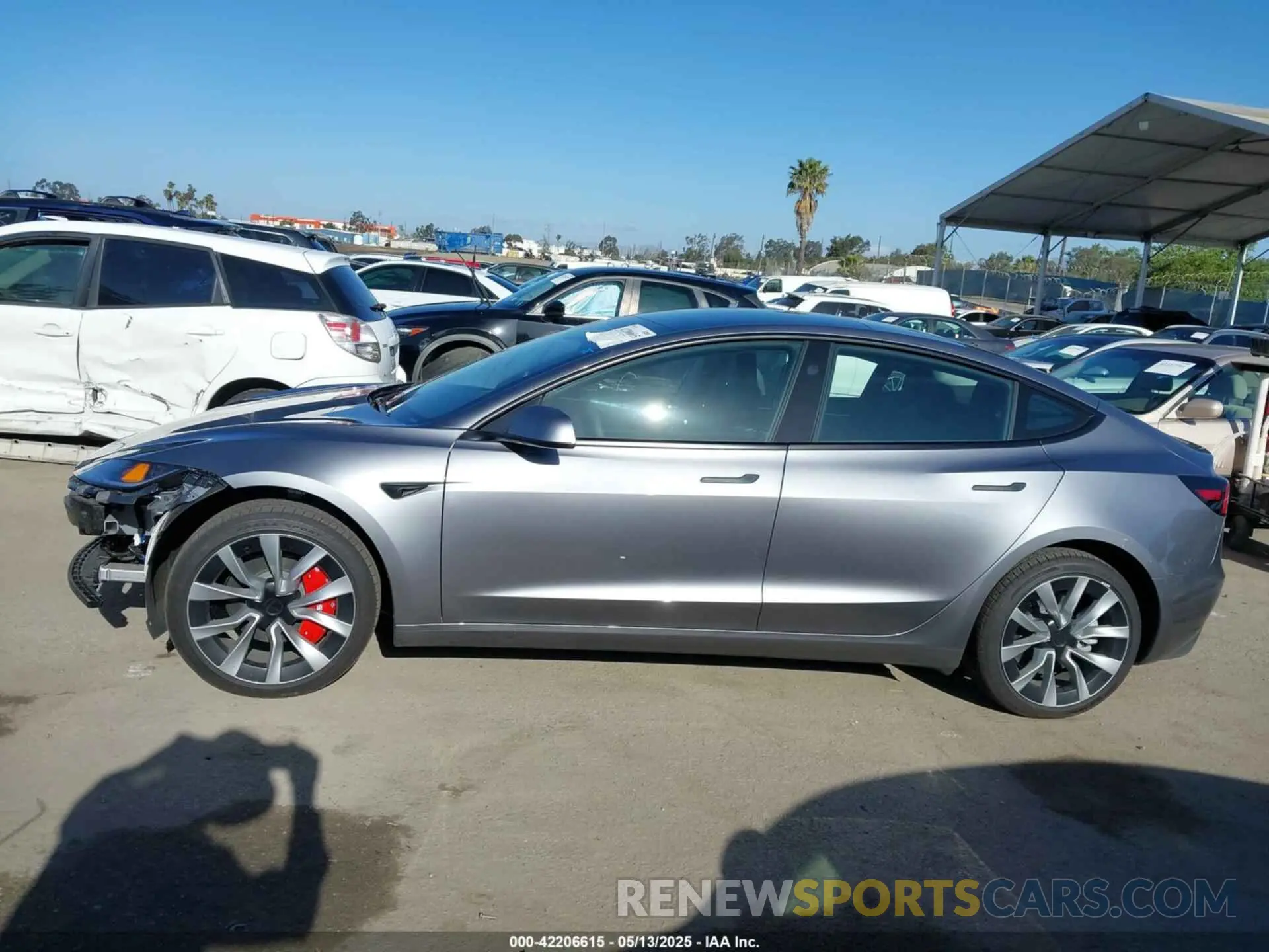 14 Photograph of a damaged car 5YJ3E1EA9RF870138 TESLA MODEL 3 2024