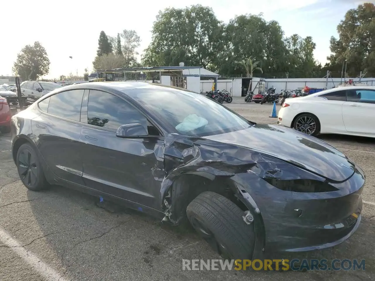 4 Фотография поврежденного автомобиля 5YJ3E1EAXRF749828 TESLA MODEL 3 2024