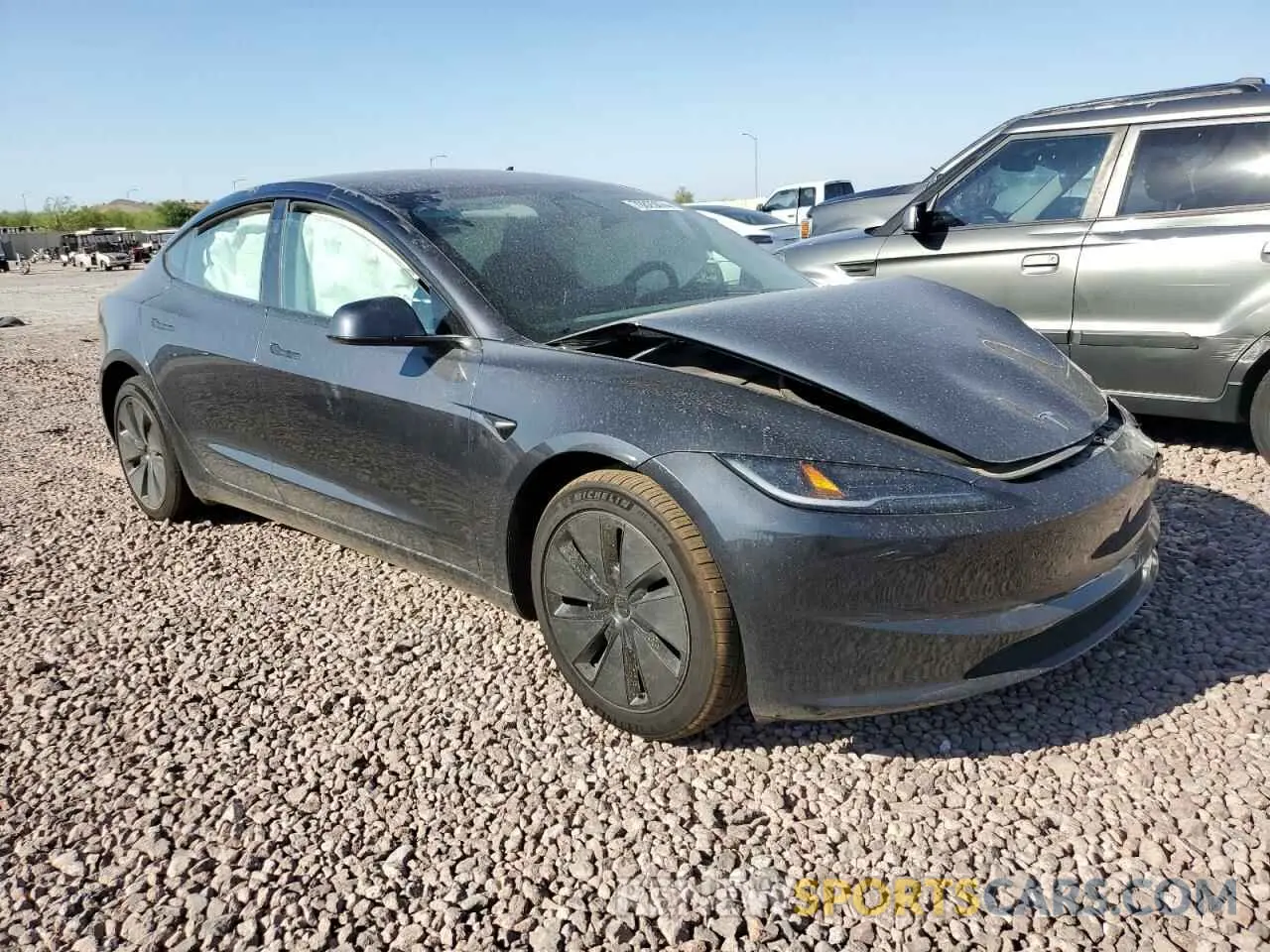 4 Photograph of a damaged car 5YJ3E1EAXRF782585 TESLA MODEL 3 2024