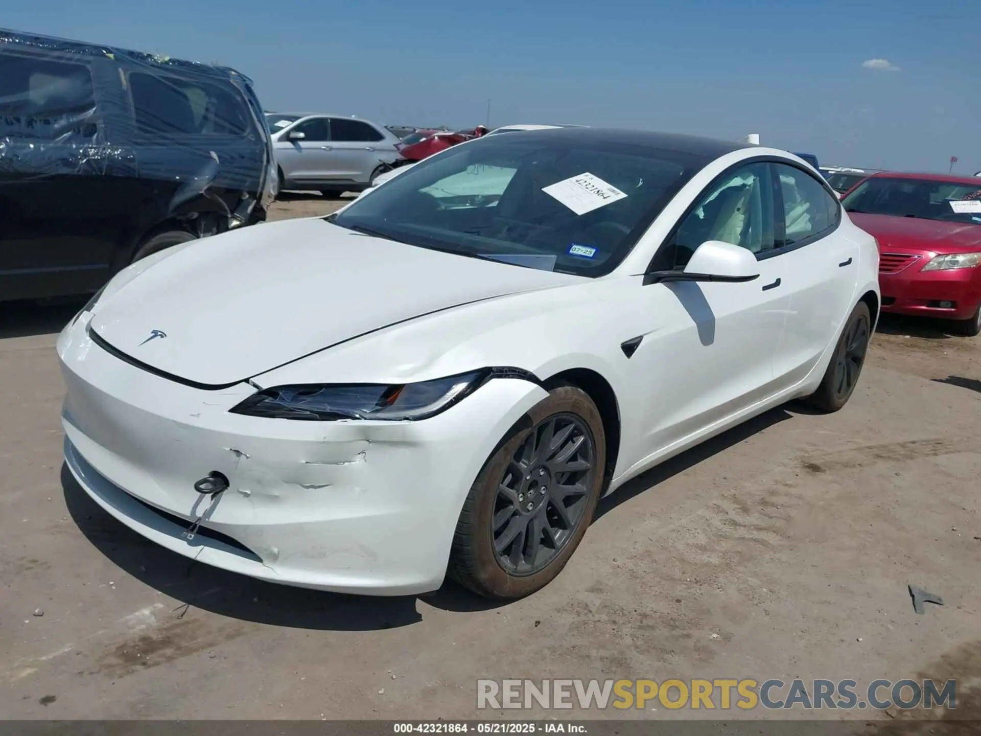 2 Фотография поврежденного автомобиля 5YJ3E1EAXRF785907 TESLA MODEL 3 2024