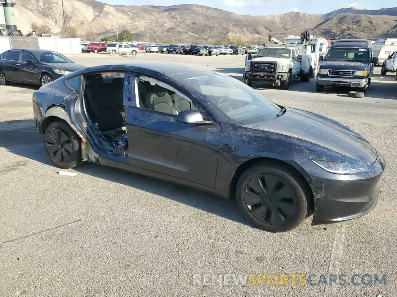 4 Photograph of a damaged car 5YJ3E1EAXRF858919 TESLA MODEL 3 2024