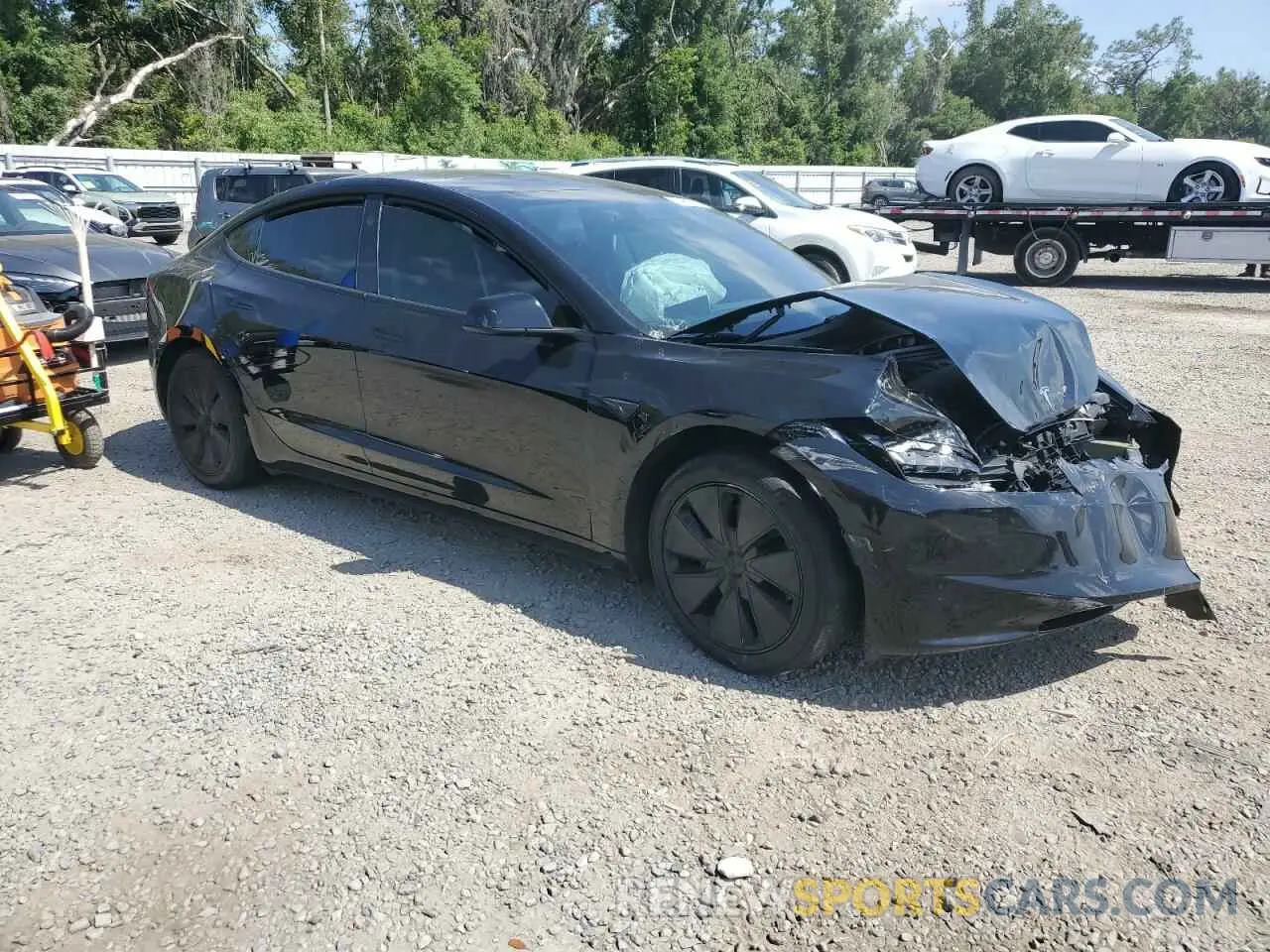 4 Photograph of a damaged car 5YJ3E1EB1RF731923 TESLA MODEL 3 2024