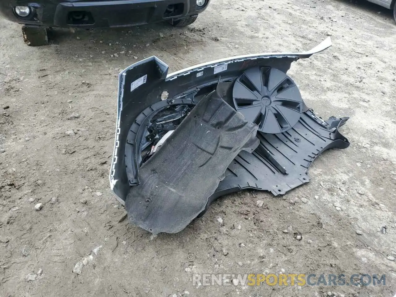 12 Photograph of a damaged car 5YJ3E1EB2RF797302 TESLA MODEL 3 2024