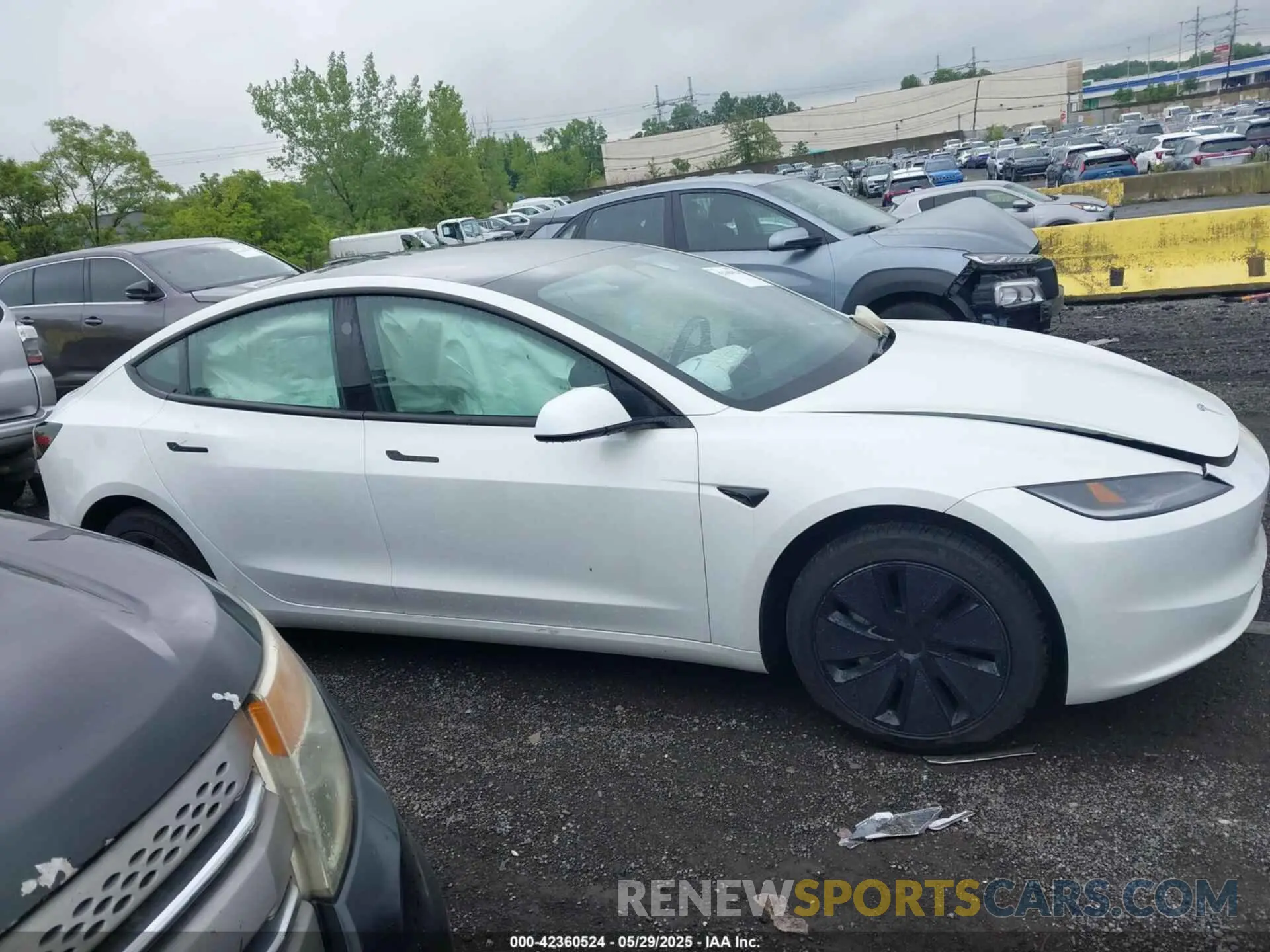 12 Photograph of a damaged car 5YJ3E1EB7RF821805 TESLA MODEL 3 2024