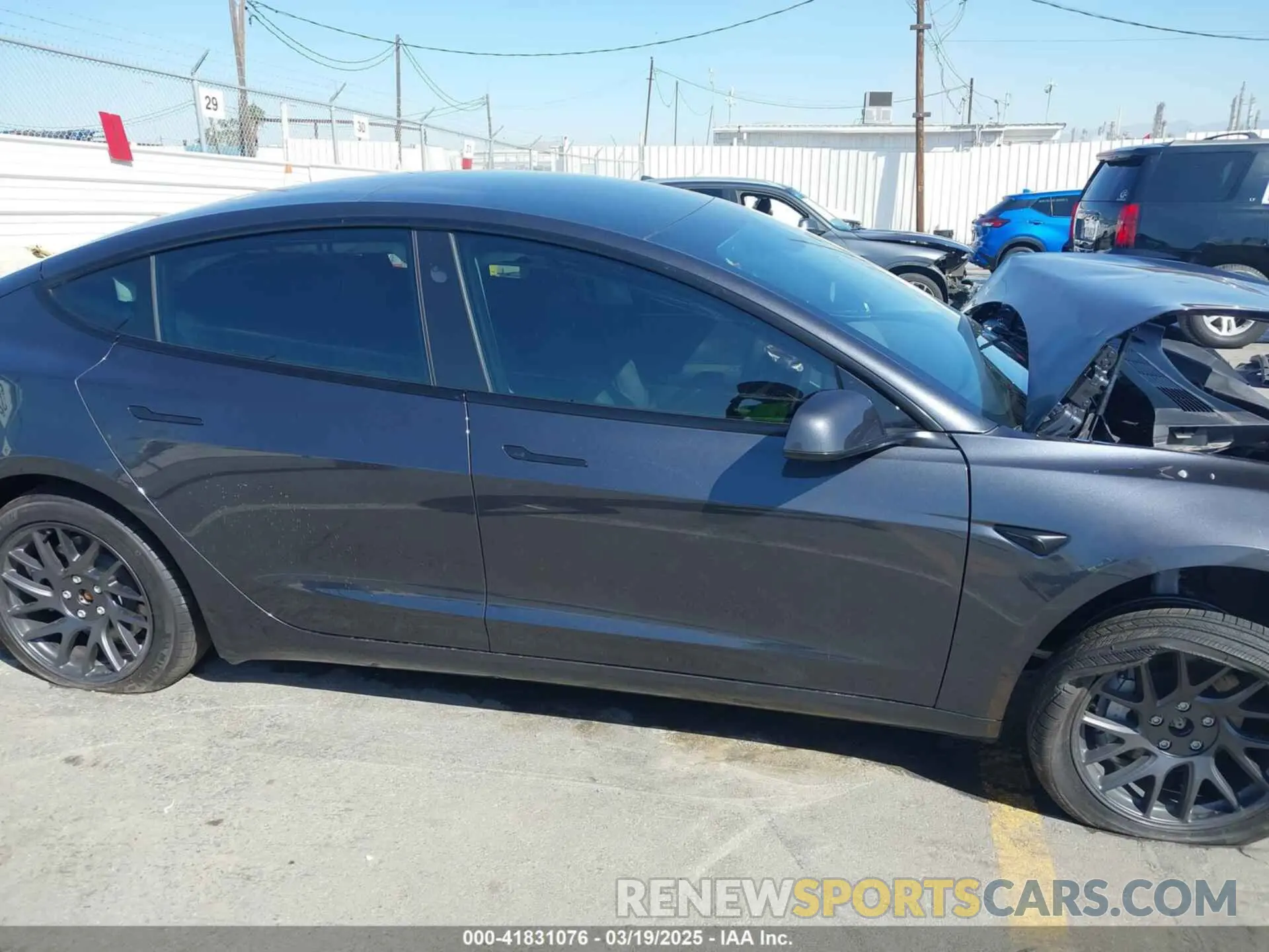 13 Photograph of a damaged car 5YJ3E1EBXRF816954 TESLA MODEL 3 2024