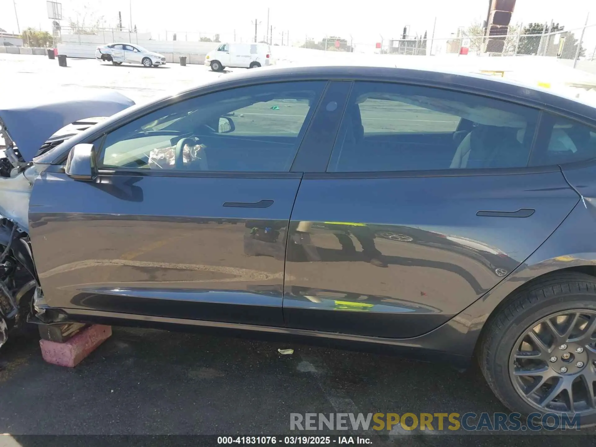 14 Photograph of a damaged car 5YJ3E1EBXRF816954 TESLA MODEL 3 2024