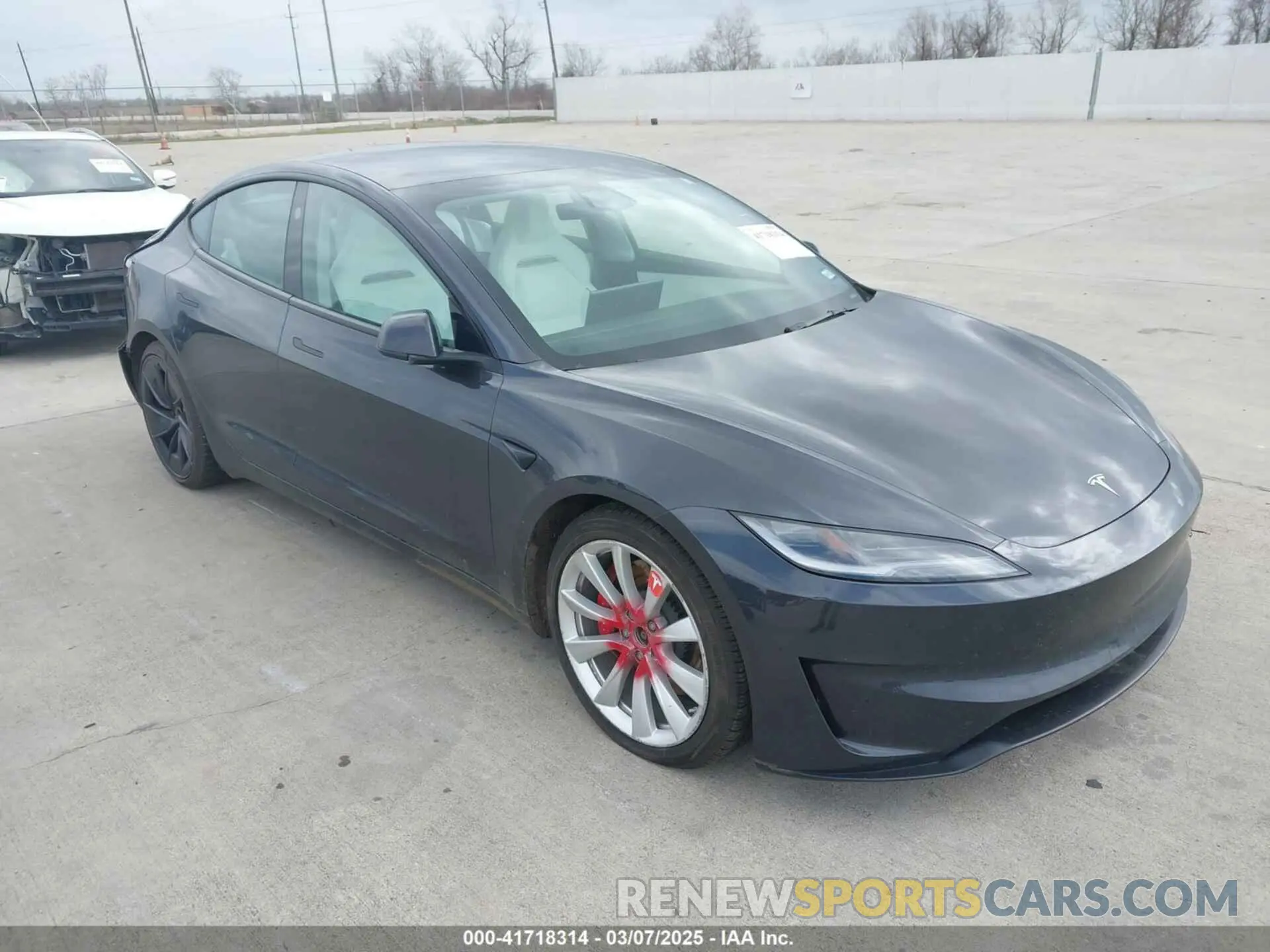 1 Photograph of a damaged car 5YJ3E1ET0RF842987 TESLA MODEL 3 2024