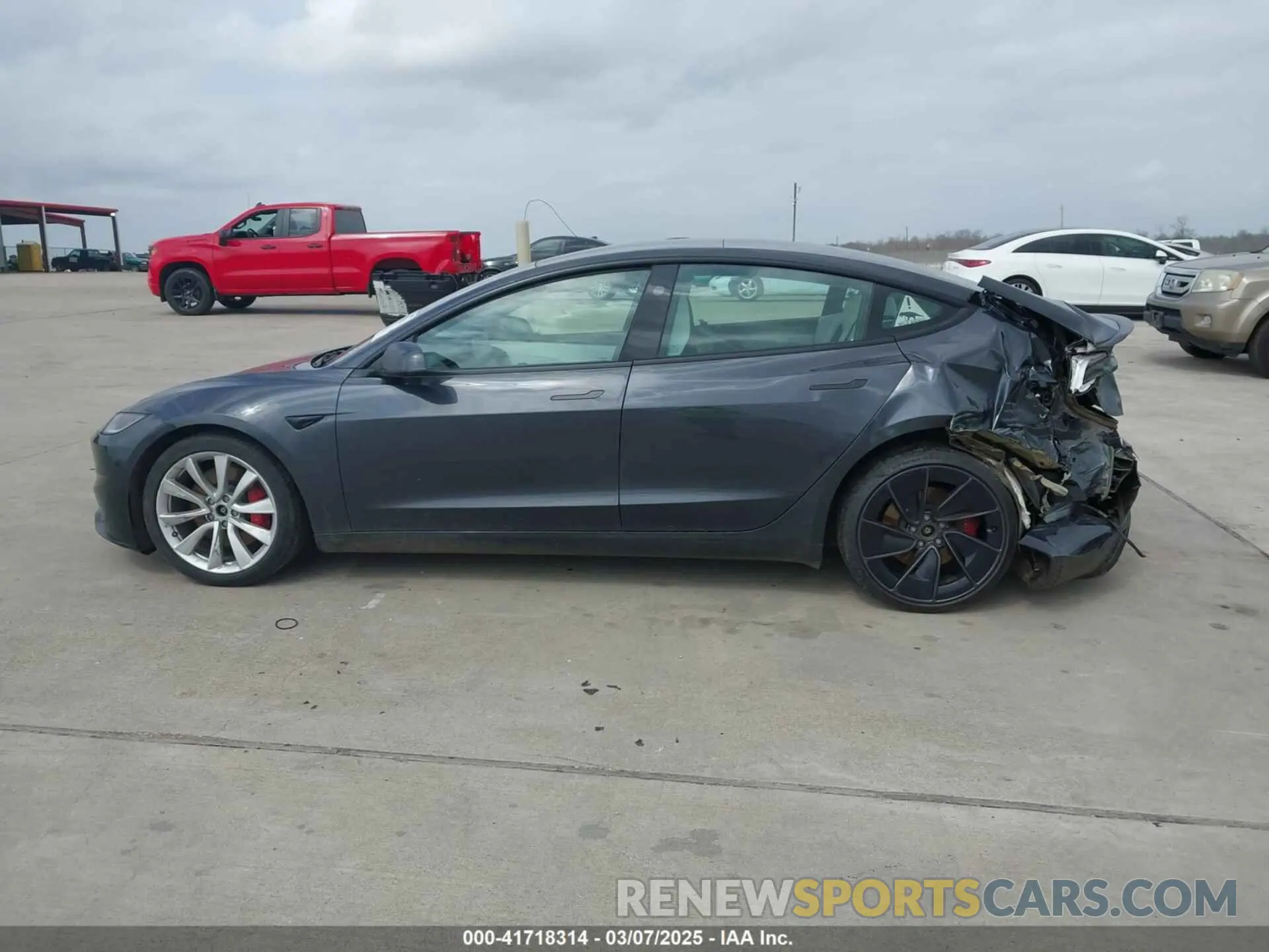 14 Photograph of a damaged car 5YJ3E1ET0RF842987 TESLA MODEL 3 2024