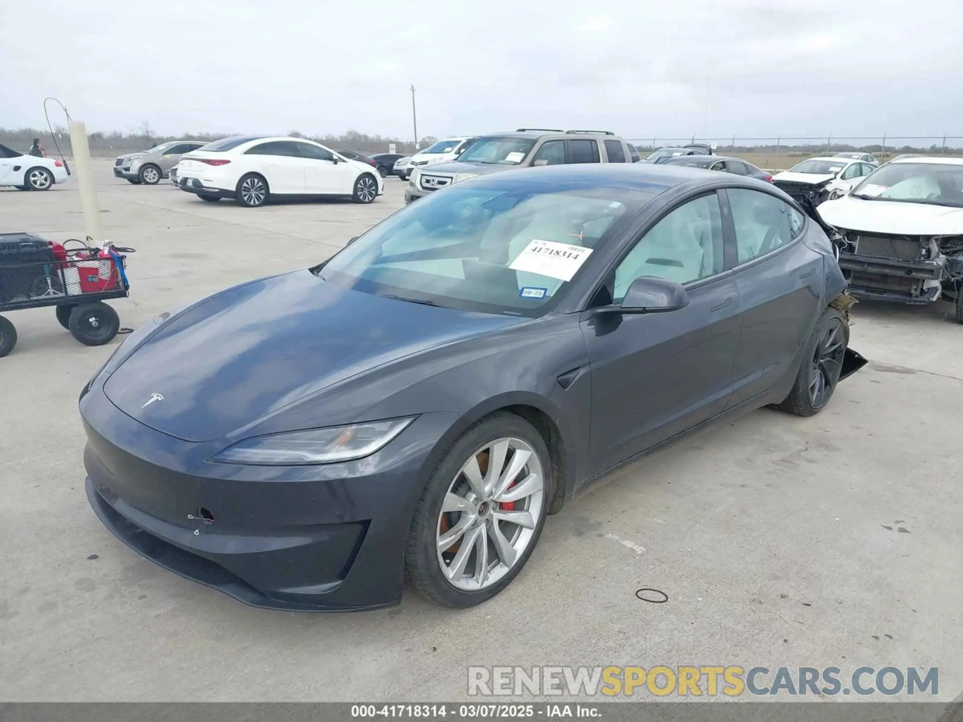 2 Photograph of a damaged car 5YJ3E1ET0RF842987 TESLA MODEL 3 2024