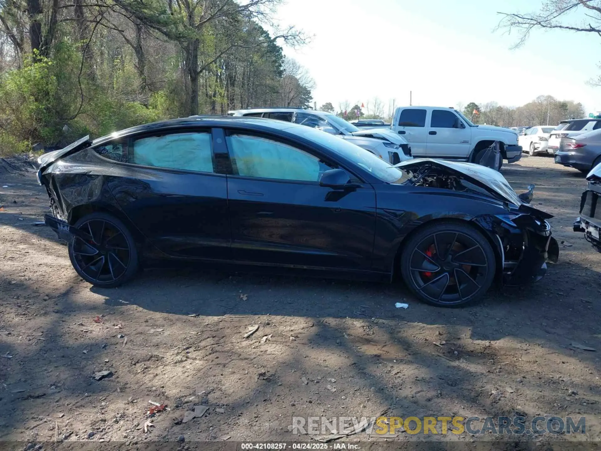 13 Photograph of a damaged car 5YJ3E1ET0RF880929 TESLA MODEL 3 2024
