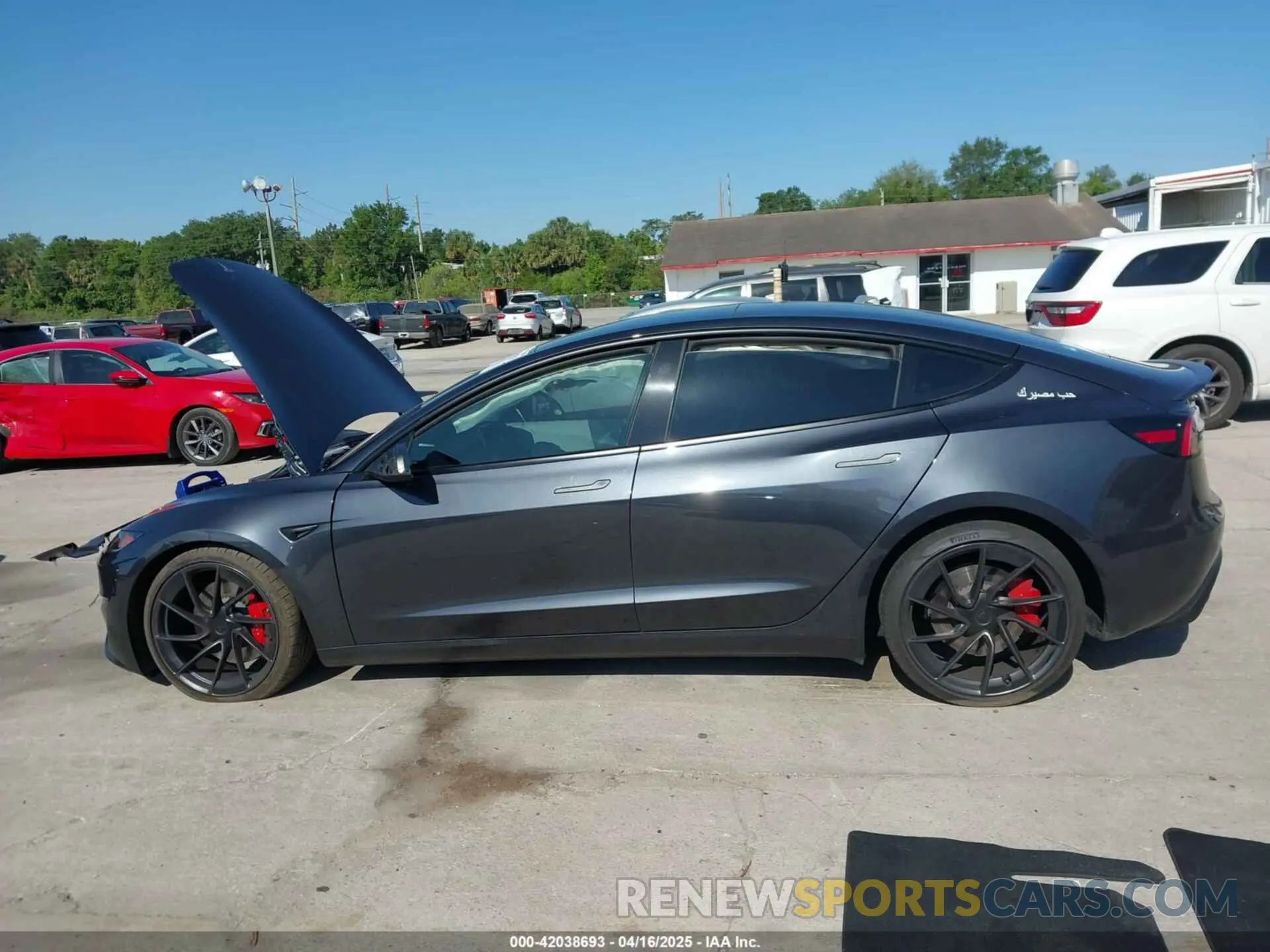 14 Photograph of a damaged car 5YJ3E1ET0RF900709 TESLA MODEL 3 2024