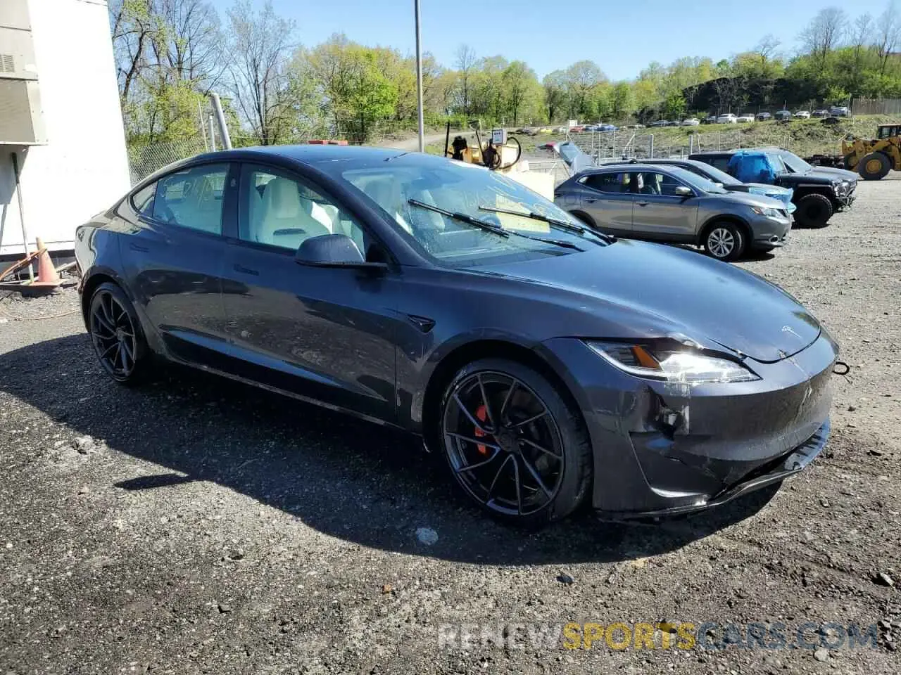 4 Photograph of a damaged car 5YJ3E1ET2RF856616 TESLA MODEL 3 2024