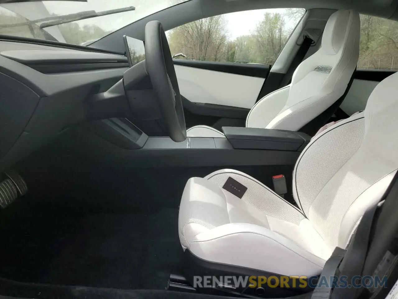 7 Photograph of a damaged car 5YJ3E1ET2RF856616 TESLA MODEL 3 2024