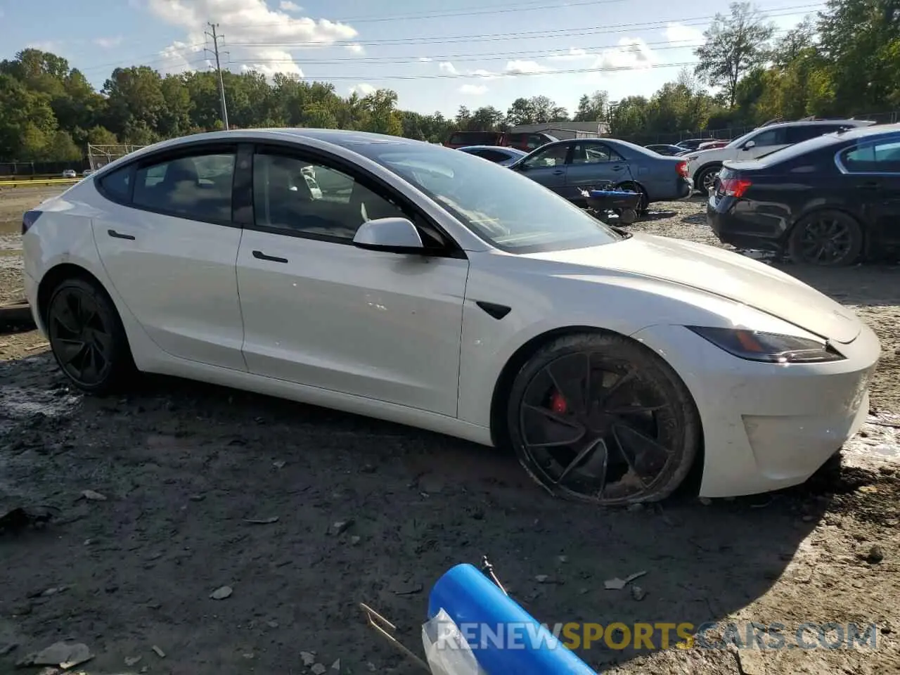 4 Photograph of a damaged car 5YJ3E1ET4RF827439 TESLA MODEL 3 2024