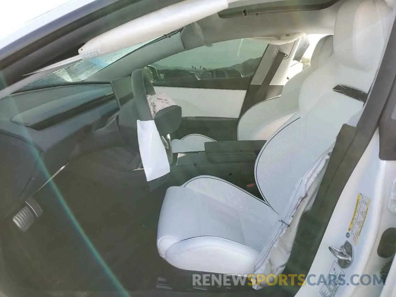 7 Photograph of a damaged car 5YJ3E1ET6RF901346 TESLA MODEL 3 2024