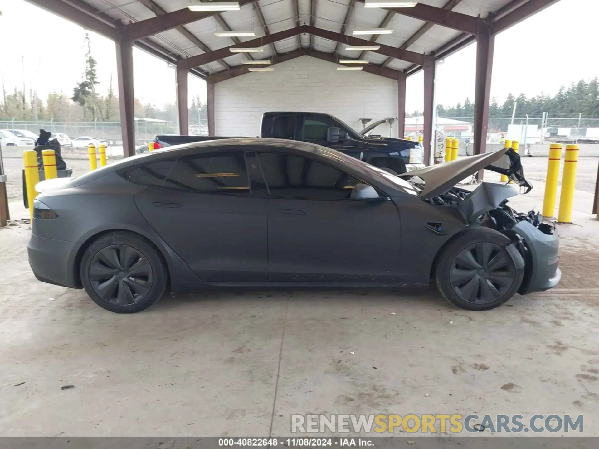 14 Photograph of a damaged car 5YJSA1E56PF530498 TESLA MODEL S 2023