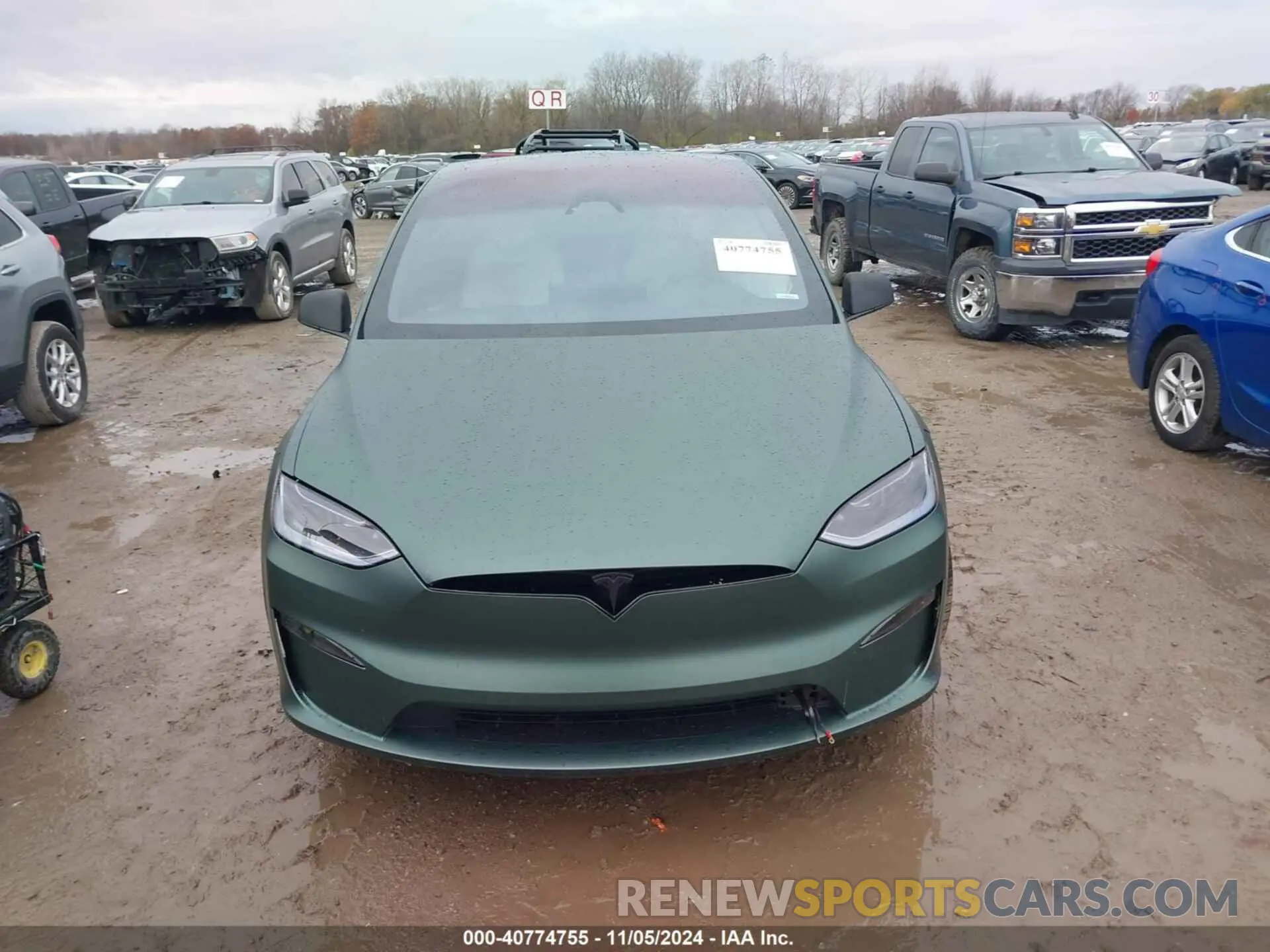 12 Photograph of a damaged car 7SAXCBE55PF425587 TESLA MODEL X 2023