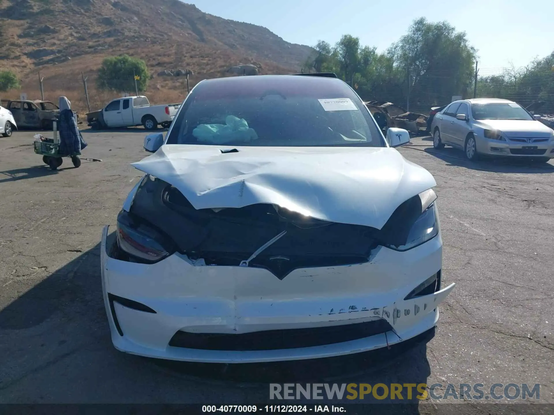 12 Photograph of a damaged car 7SAXCDE53PF423512 TESLA MODEL X 2023