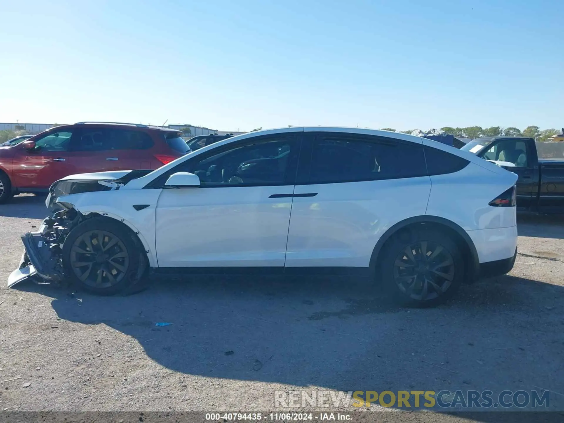 13 Photograph of a damaged car 7SAXCBE5XRF442615 TESLA MODEL X 2024