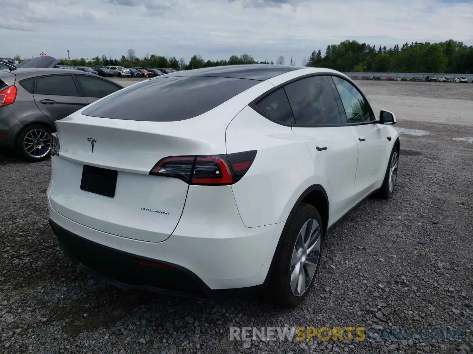 4 Photograph of a damaged car 5YJYGDEE3LF052223 TESLA MODEL Y 2020