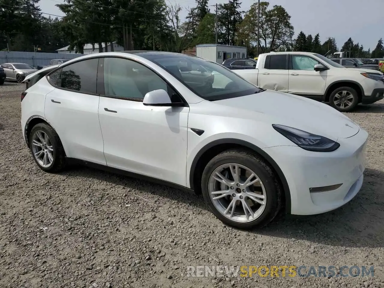4 Photograph of a damaged car 5YJYGDEF2LF006357 TESLA MODEL Y 2020
