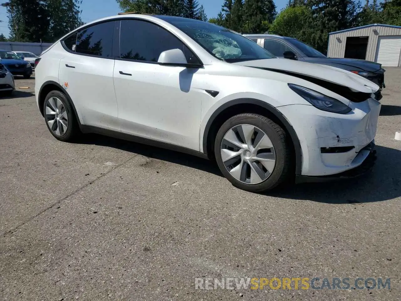 4 Photograph of a damaged car 5YJYGDEF9LF023060 TESLA MODEL Y 2020