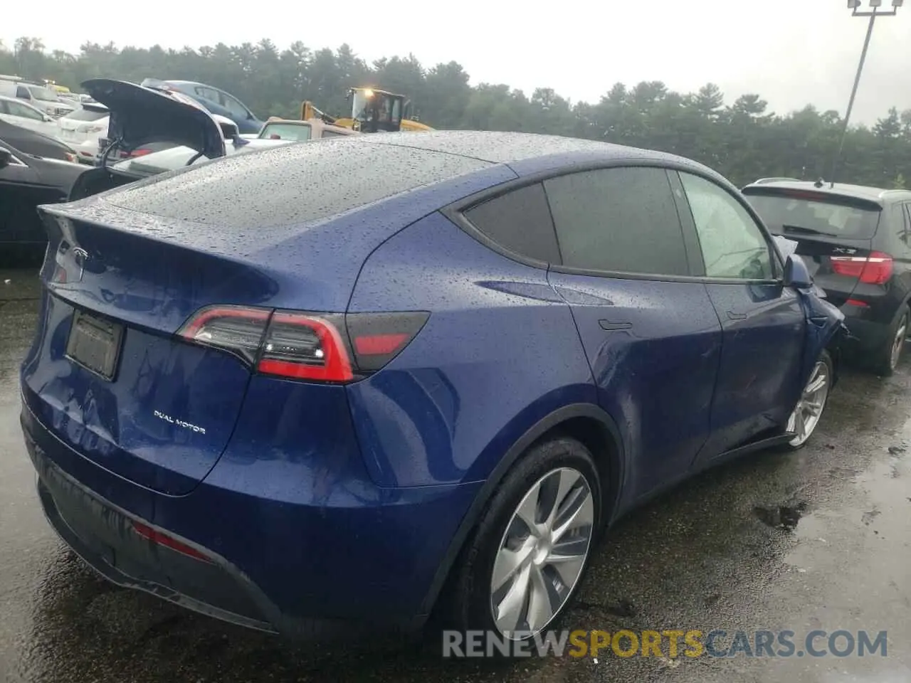4 Photograph of a damaged car 5YJYGDEE0MF083818 TESLA MODEL Y 2021