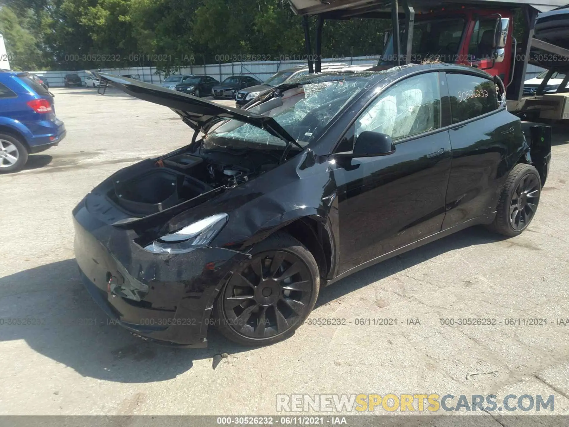 2 Photograph of a damaged car 5YJYGDEE2MF139760 TESLA MODEL Y 2021