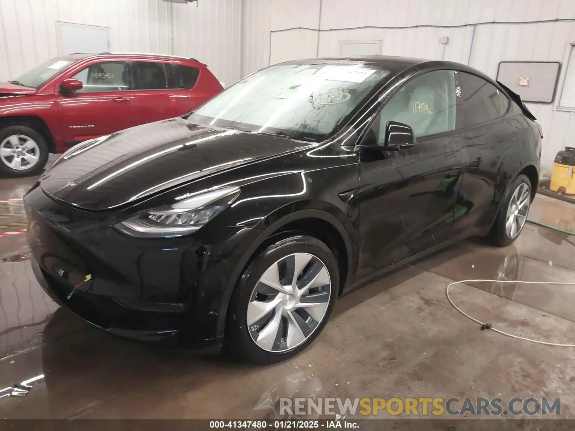 2 Photograph of a damaged car 5YJYGDEE5MF075911 TESLA MODEL Y 2021