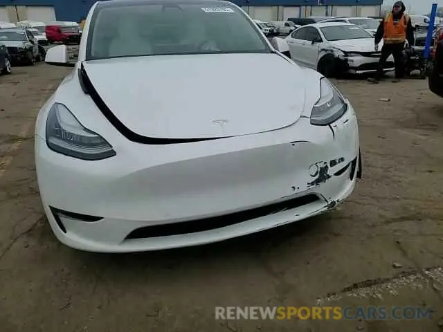 11 Photograph of a damaged car 5YJYGDEE7MF220608 TESLA MODEL Y 2021