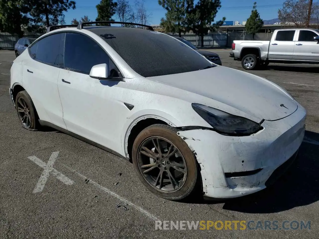 4 Photograph of a damaged car 5YJYGDEE7MF228417 TESLA MODEL Y 2021