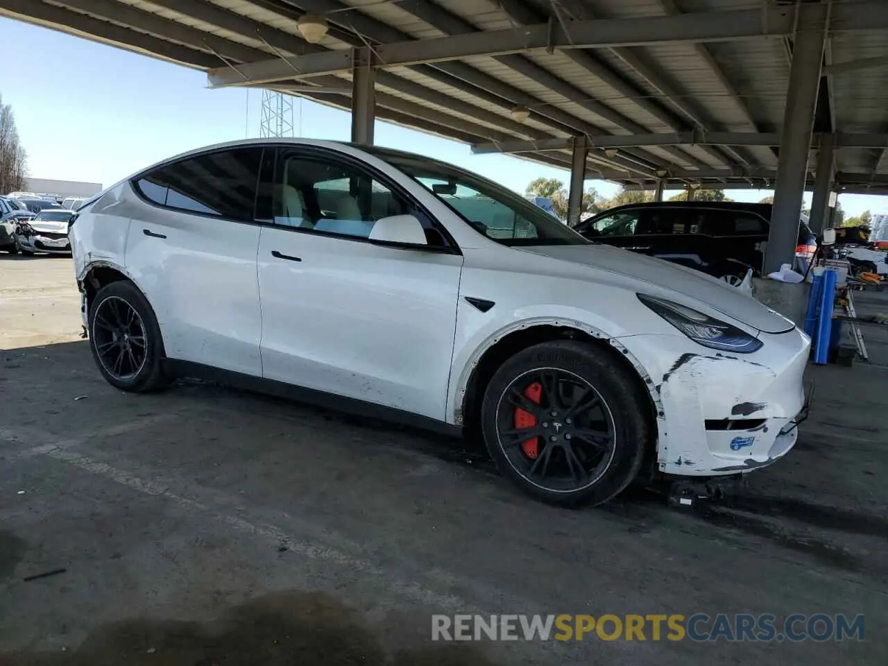 4 Photograph of a damaged car 5YJYGDEE7MF228787 TESLA MODEL Y 2021