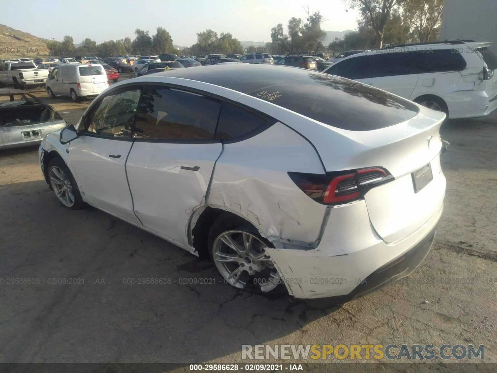 3 Photograph of a damaged car 5YJYGDEEXMF071515 TESLA MODEL Y 2021