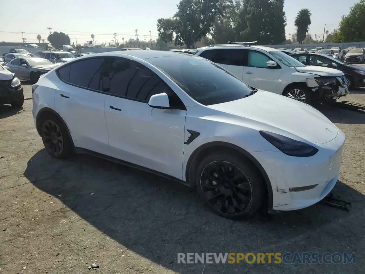 4 Photograph of a damaged car 5YJYGDEEXMF158864 TESLA MODEL Y 2021