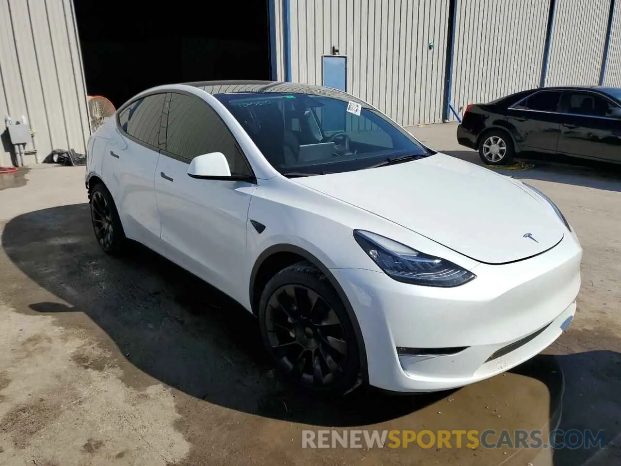 4 Photograph of a damaged car 7SAYGAEE1NF432536 TESLA MODEL Y 2022