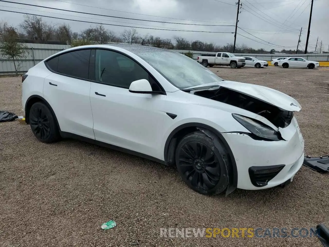 4 Photograph of a damaged car 7SAYGAEE8NF520080 TESLA MODEL Y 2022