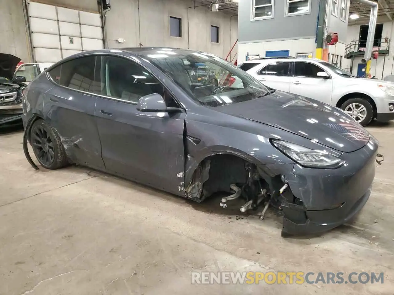 4 Photograph of a damaged car 7SAYGDEE0NA017223 TESLA MODEL Y 2022
