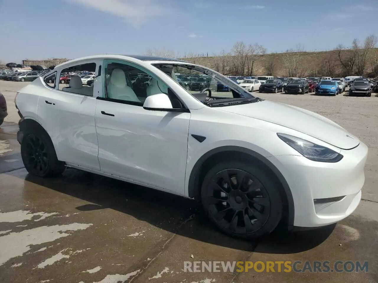 4 Photograph of a damaged car 7SAYGDEE0NF436885 TESLA MODEL Y 2022