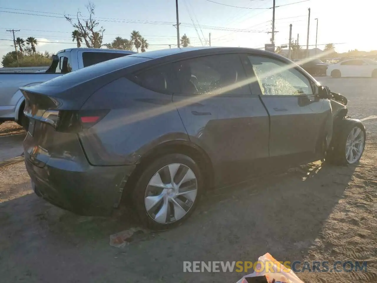 3 Photograph of a damaged car 7SAYGDEE3NA004899 TESLA MODEL Y 2022