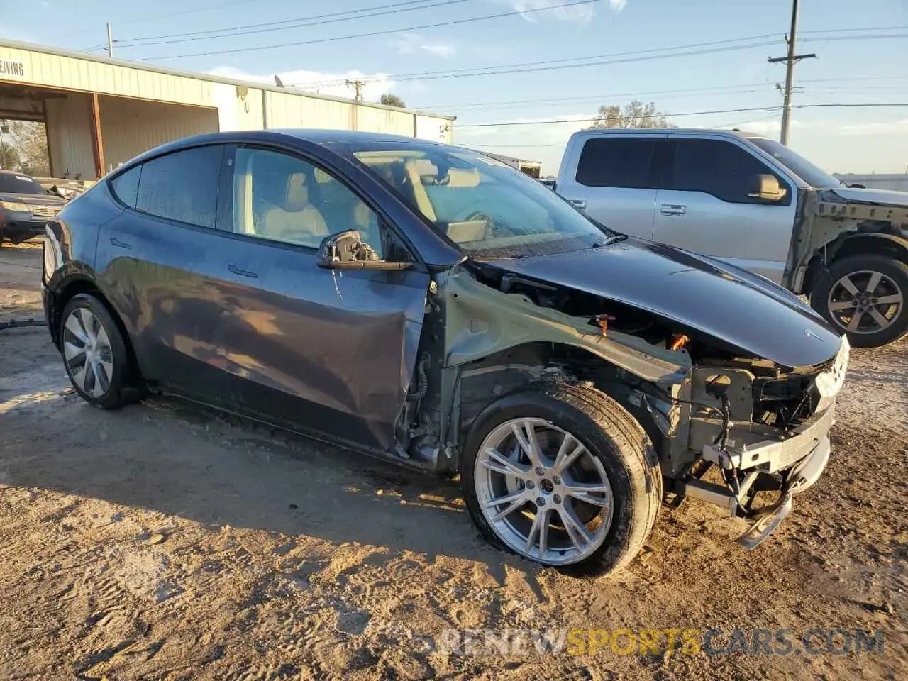 4 Photograph of a damaged car 7SAYGDEE3NA004899 TESLA MODEL Y 2022